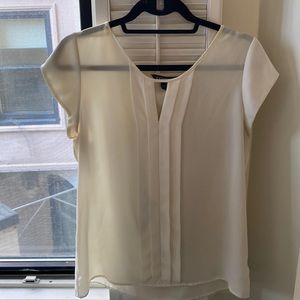 Express white t shirt with key hole. Good for work